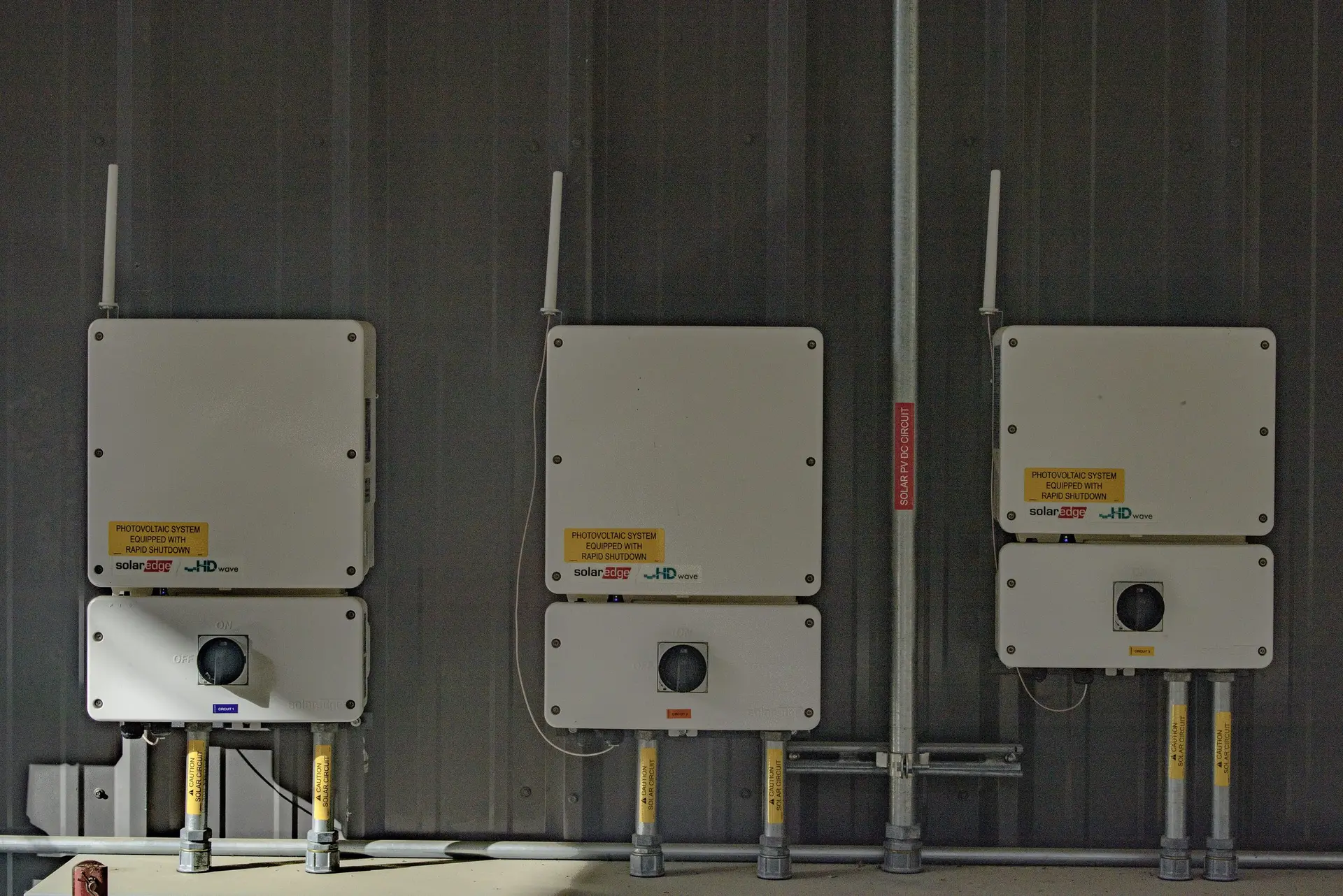 Solar inverters and control units on a wall