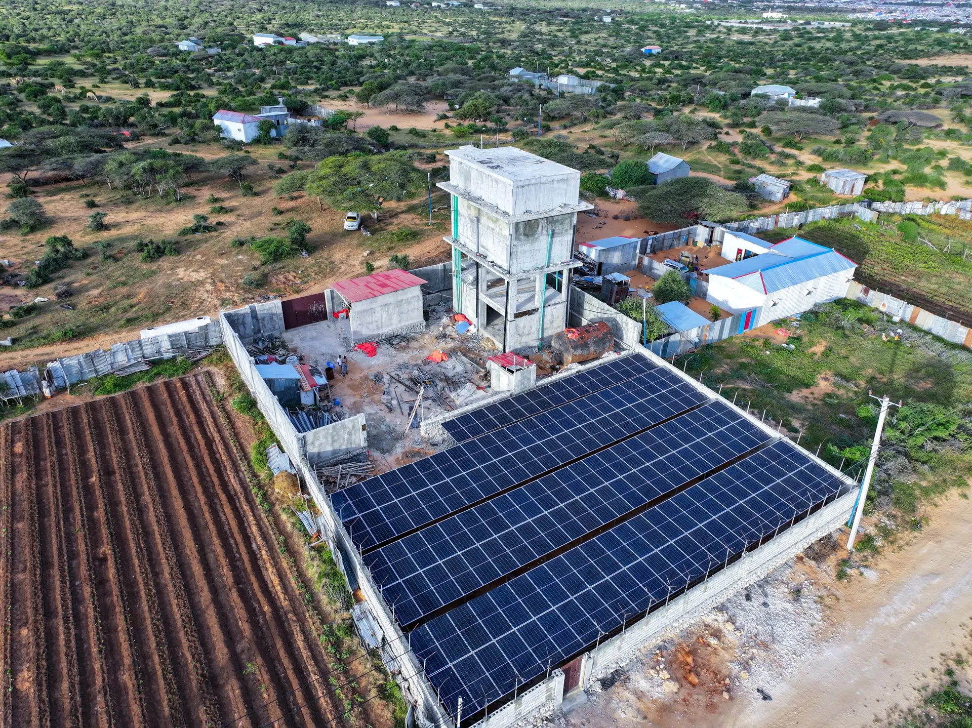 Aerial view of the Horseed solar array beside the water tower in Dayniile