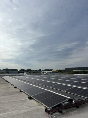 Rooftop solar panels on an industrial building in Nederweert