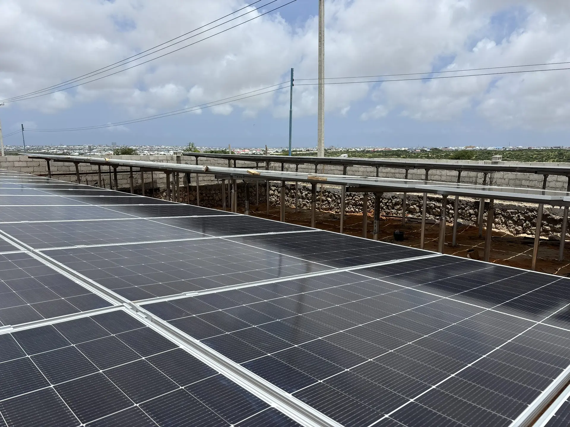 Long rows of ground-mounted solar panels