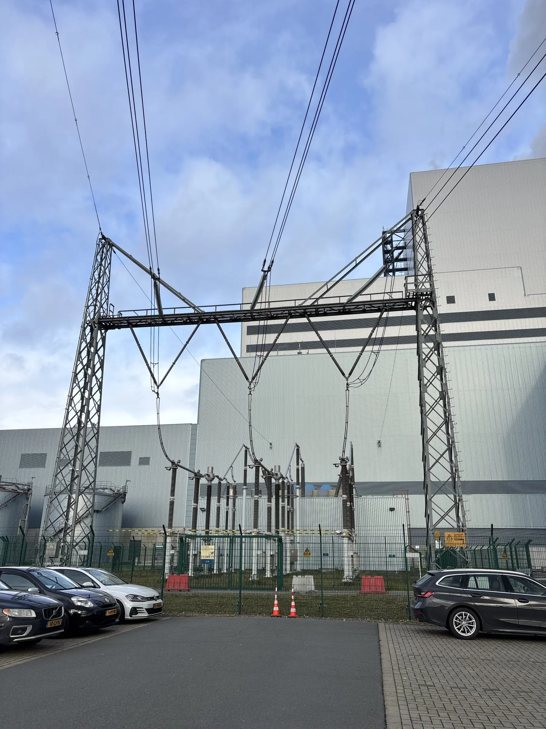 Substation with high-voltage pylons and overhead lines